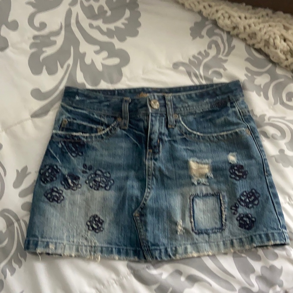 American Eagle Outfitters jean skirt, Size 0 distressed Floral embroidery.